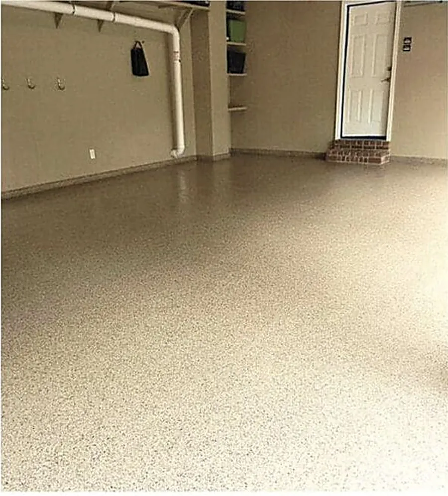 Concrete floor finished with full-broadcast decorative epoxy flake