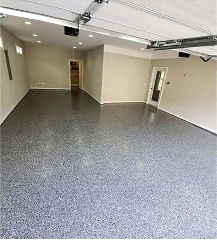 Garage floor finished with gray flake and a clear protective topcoat